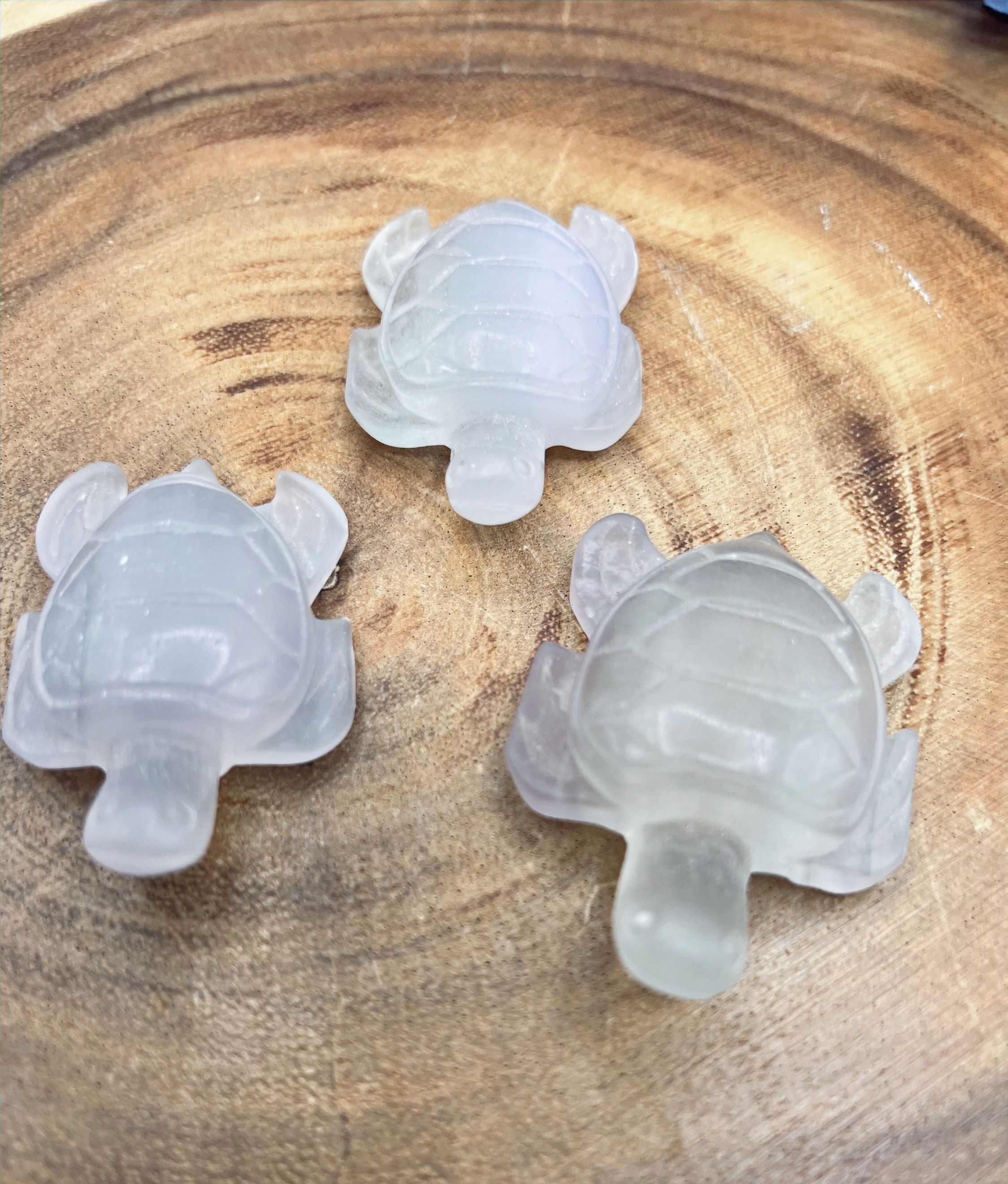 "Fluorite Sea Turtle Carvings: Dive into Tranquility & Energy"  Product Description: Explore serenity and vibrant energy with