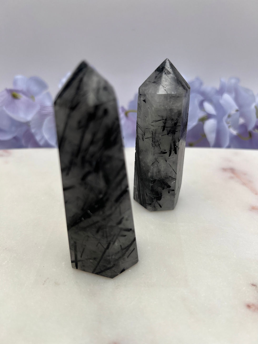 Thumbnail: Black Tourmalinated Quartz Points: Protection, Purification, and Amplification