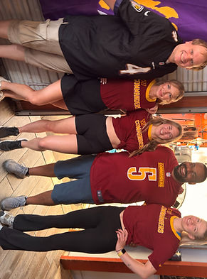 Bartenders pouring draft beer at outdoor sports bar Washington DC
