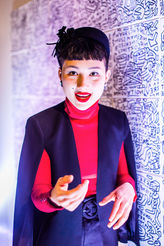 Charlie Casanova at a event hosted by share (brand) in Berlin in front of drawings shot by vollvincent