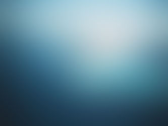 Airplane flying above vibrant blue ocean and tropical island, under a clear sky. A serene and expansive aerial view.