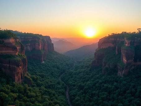 Sunset over lush green canyon with red rock cliffs. The sun casts a warm glow, creating a serene and tranquil atmosphere.