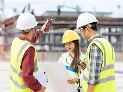 Expert witness surveyor analyzing construction dispute documents