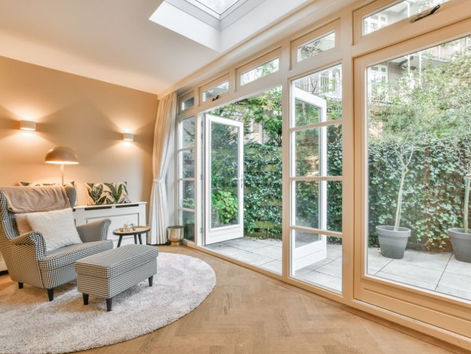 Homeowners reviewing design plans with DAR LLC team during initial design-build consultation