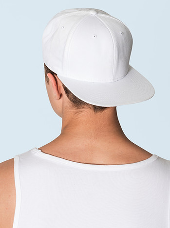 teenage-boy-white-snapback-cap-tank-top-street-fashion-shoot-rear-view.jpg