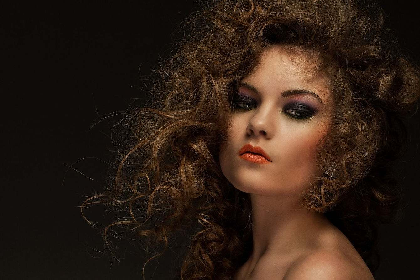 beautiful-woman-with-curls-makeup_144627-5083.jpg