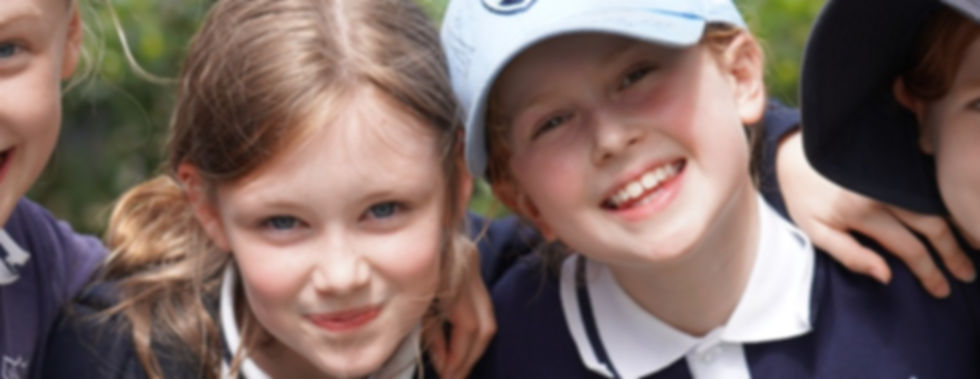 FLASCA children smiling at the camera on a sunny afternoon!