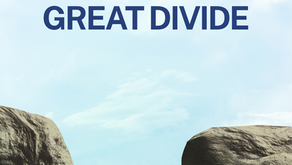 Sky and hills backdrop with two cliffs framing the text "Mentoring the Great Divide" and "Military Mentors" in bold blue font.