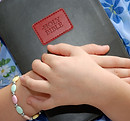 Girl Holding BIble