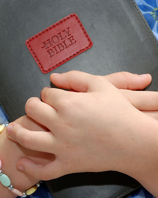Girl Holding BIble