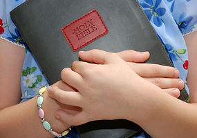 Girl Holding BIble