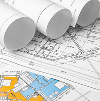 architectural-construction-plans-paper-on-table.jpg