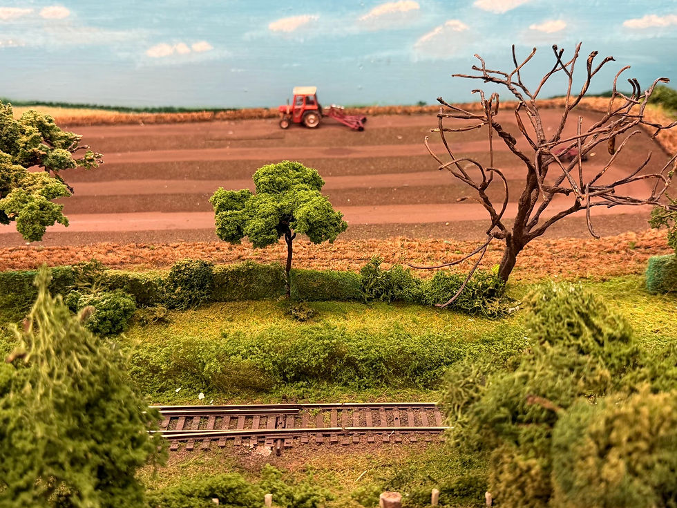 The Layout has many active features including a ploughing tractor!