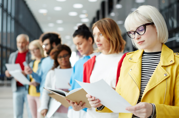 People waiting in line for an interview