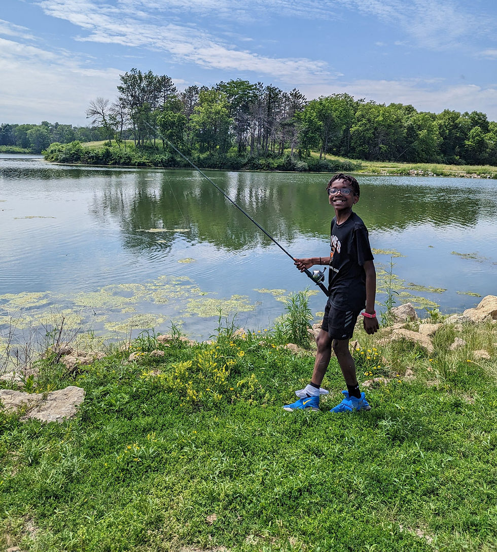 Summer Nature Camp. Casting practice to learn to fish at Hickory Grove Park