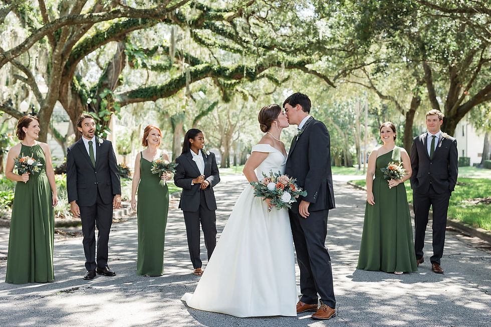Stunning Bridal Party in shades of Green, walking under the century old oak trees.