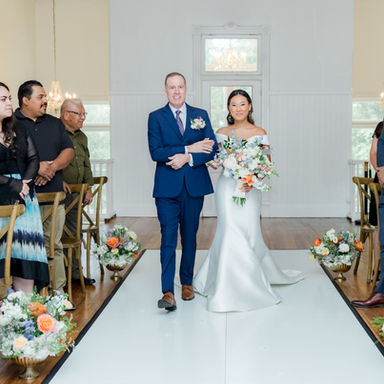Venue 1902 Bride walking down the aisle with her Dad