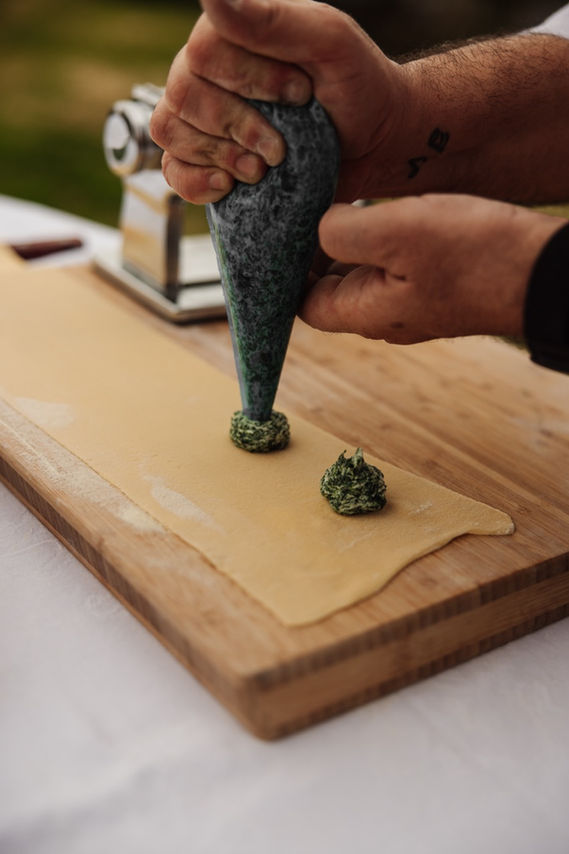 Spinach ravioli prepared during a cooking class in Tuscany