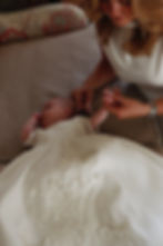 LIDY LOOKING AT BABY IN CHRISTENING DRESS