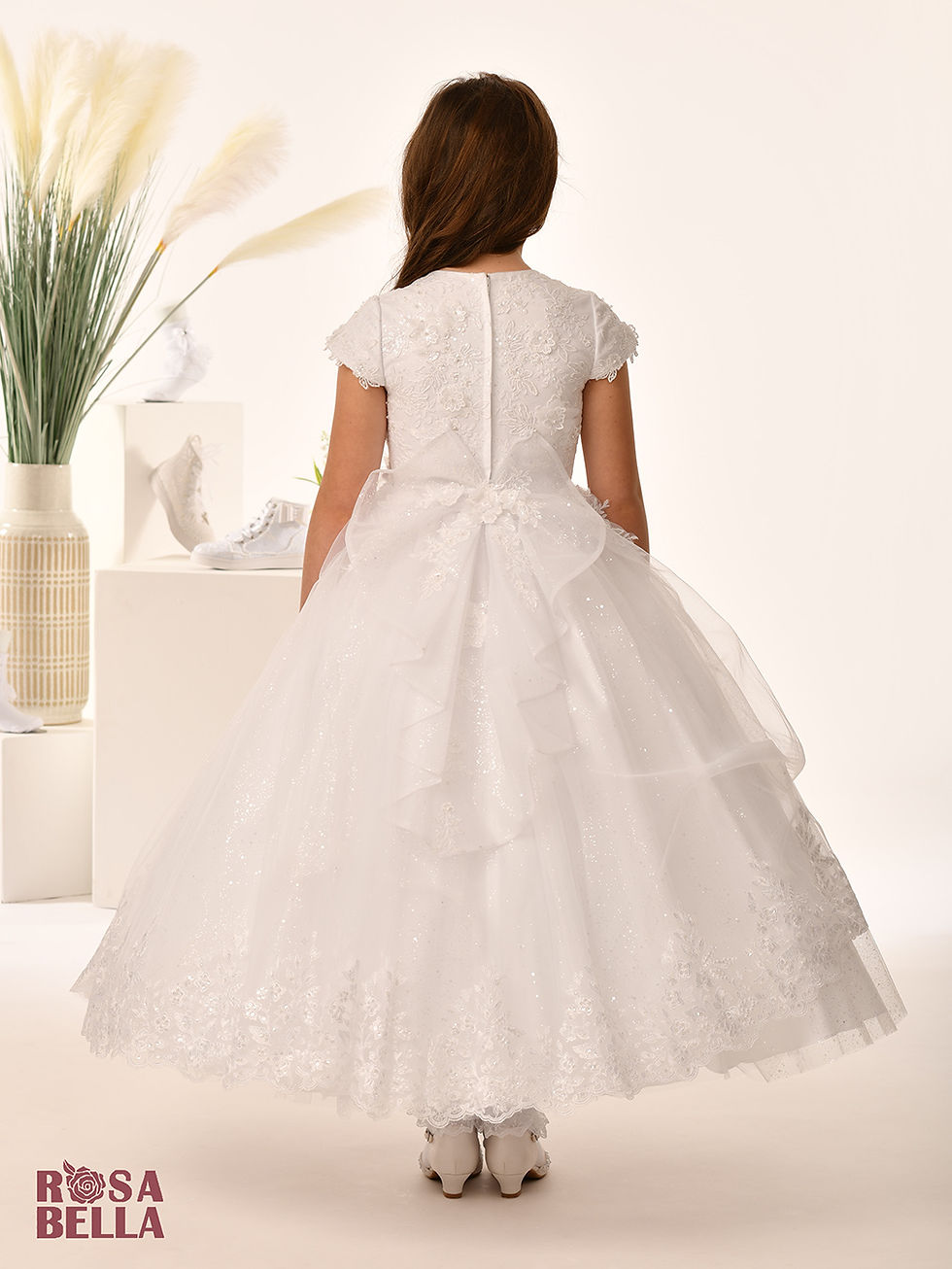 Thumbnail: child wearing a communion dress