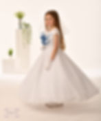 girl wearing holy communion dress