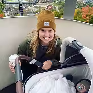 Brittani Ali with her infant in their stroller.