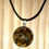 Thumbnail: Tiger’s eye, pyrite orgonite faceted on 304 stainless setting with adjustable