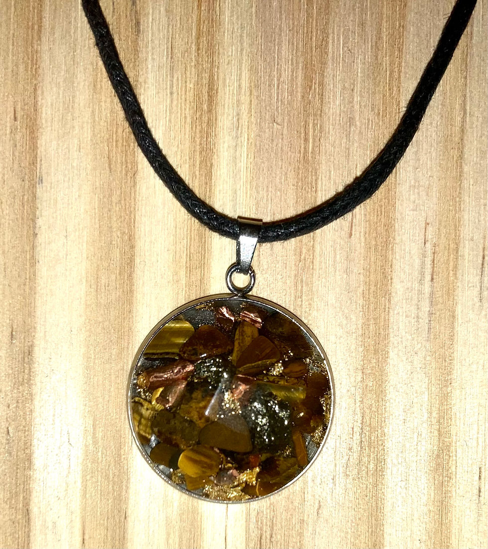 Thumbnail: Tiger’s eye, pyrite orgonite faceted on 304 stainless setting with adjustable