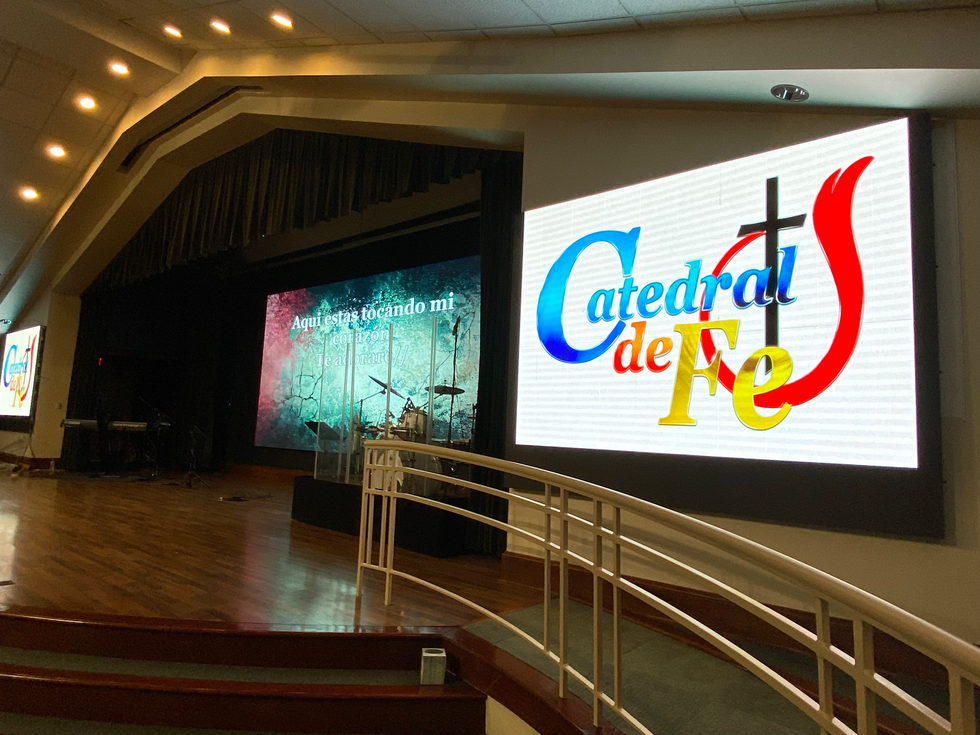 Large center LED wall with side panels for enhanced worship visuals