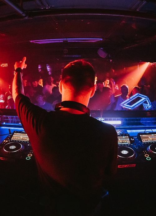 dj club night, behind stage POV, nightclub