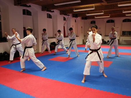 Adults training traditional karate in a structured dojo class at Soaring Eagle Karate in Keighley