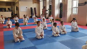 Children taking part in a structured kids karate class at Soaring Eagle Karate in Keighley