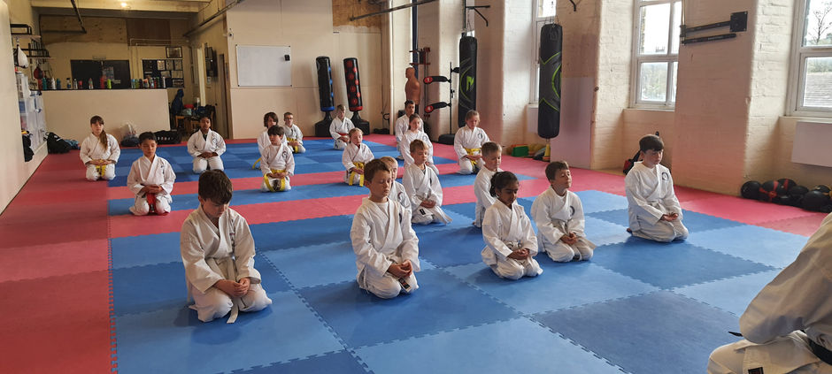 Children taking part in a structured kids karate class at Soaring Eagle Karate in Keighley