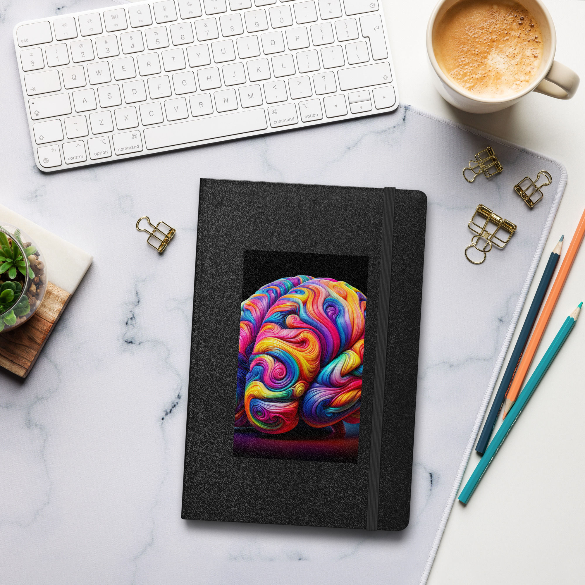 colorful brain on a hardcover notebook with multiple colors