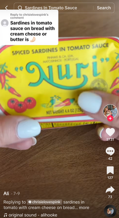 A screenshot of Tiktok user @alihooke's post featuring tinned fish in her "girl dinner."