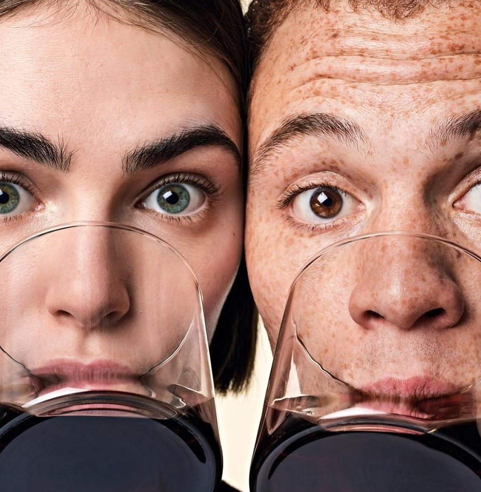 Image by Bobby Doherty depicting two people drinking coffee out of a glass for DTC coffee company Cometeer. 