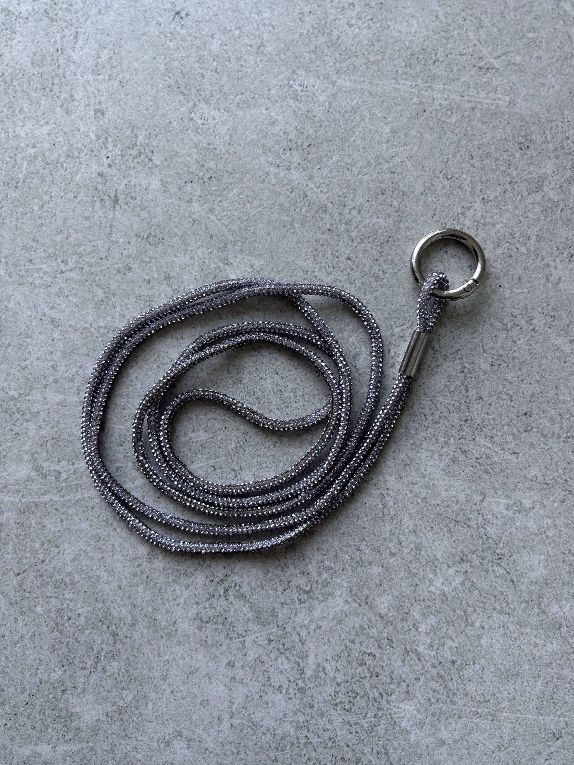 ШНУРОК ДОВГИЙ ФІОЛЕТОВИЙ В КАМІНЦЯХ