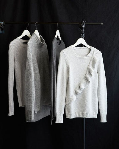 hanging sweaters.jpeg