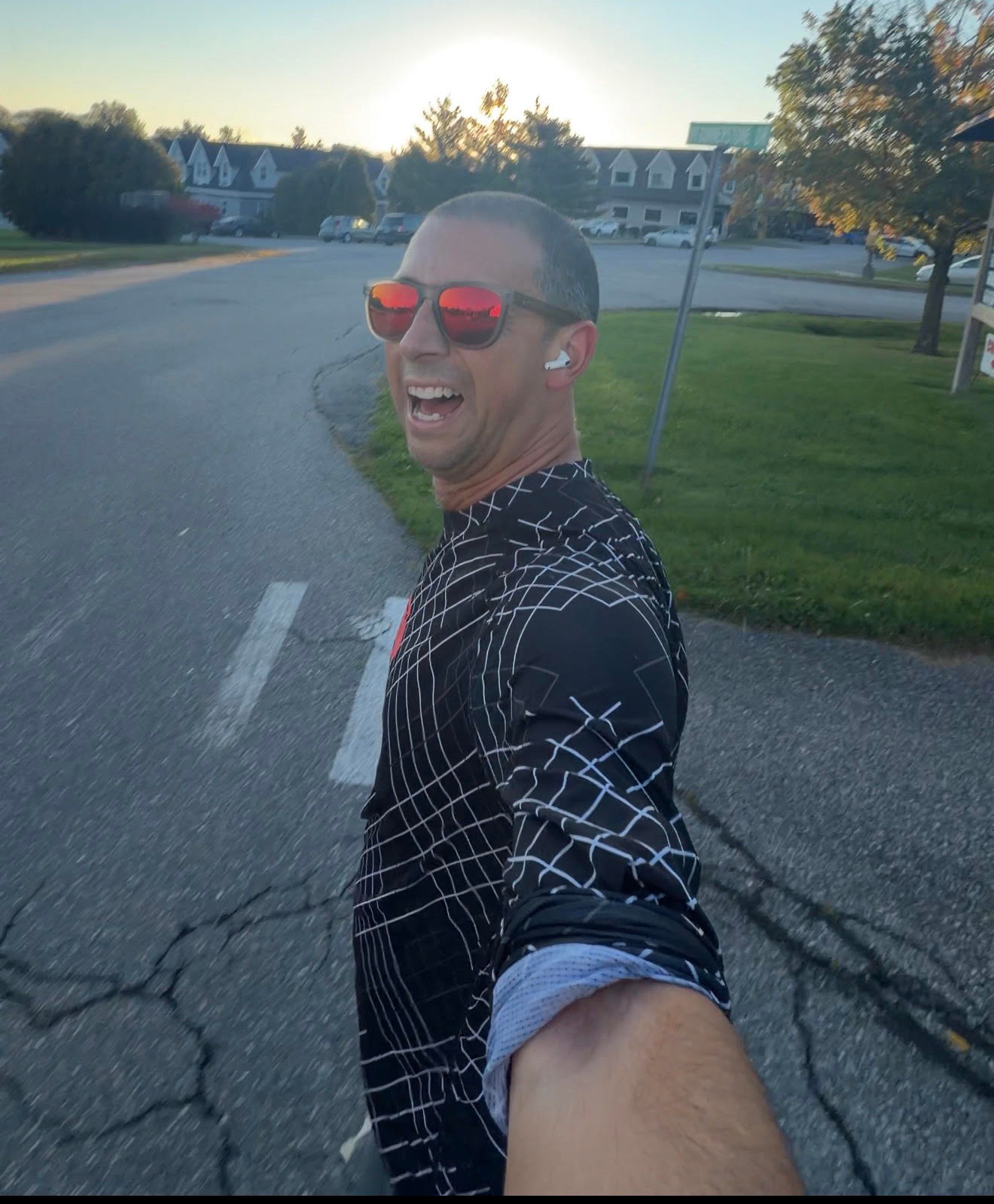 A runner out on an easy run around a neighborhood in the morning