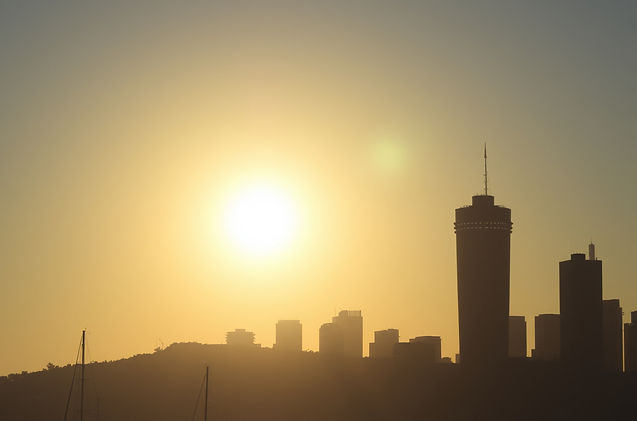 morning sun over harbor skyline.jpg