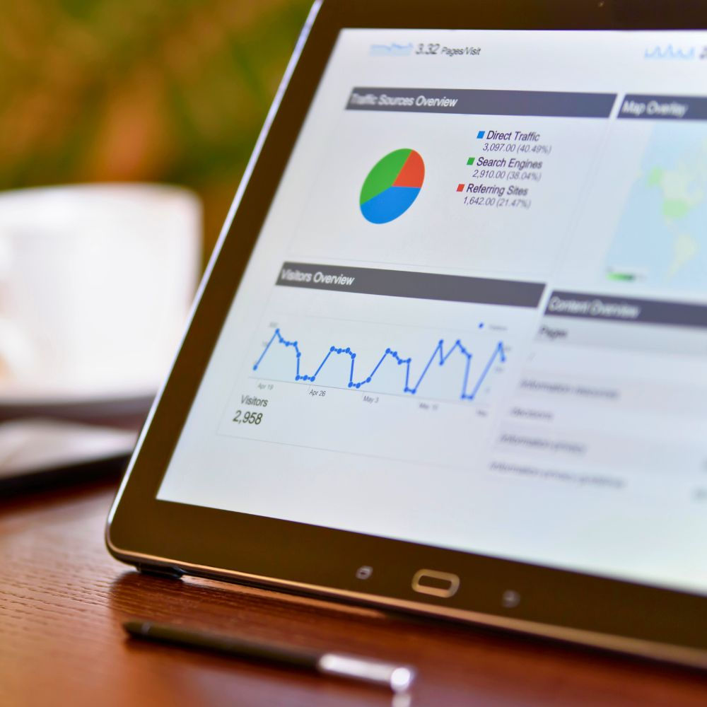 A tablet showing the results of website traffic on an analytics portal