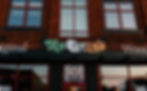 Rafferty's Pizza, a beloved spot in Crosby, warmly invites visitors with its charming facade on West Main Street.