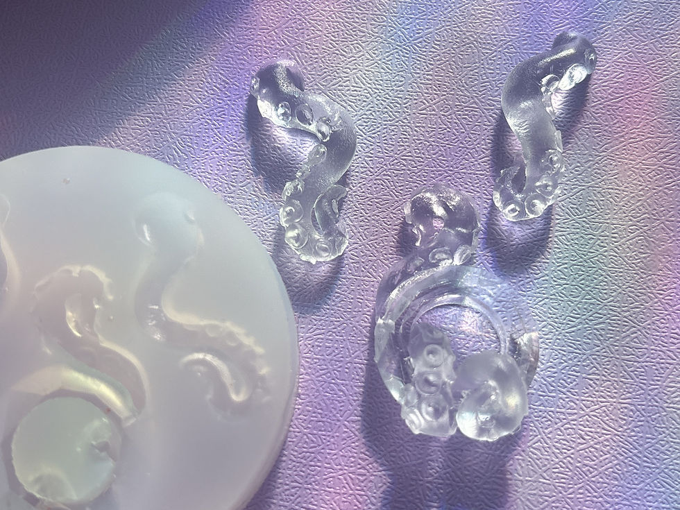 Thumbnail: Octopus Tentacle Pendant and Earring Set