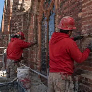 crew working on building in boston