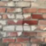A cracked brick wall