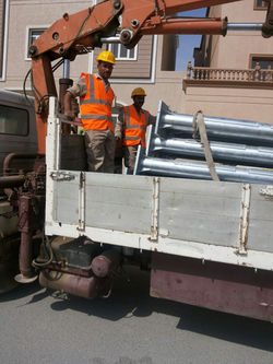Ready To unload Street light Poles