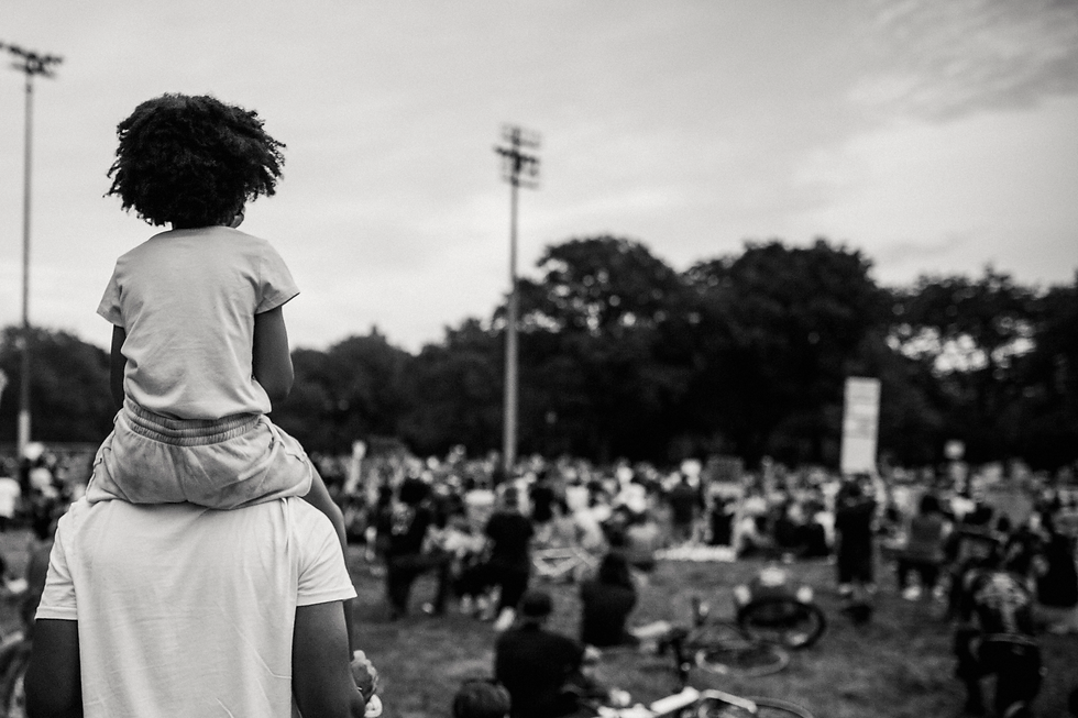 person-with-a-child-on-his-shoulders-loo