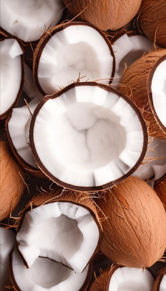 A pile of whole coconuts