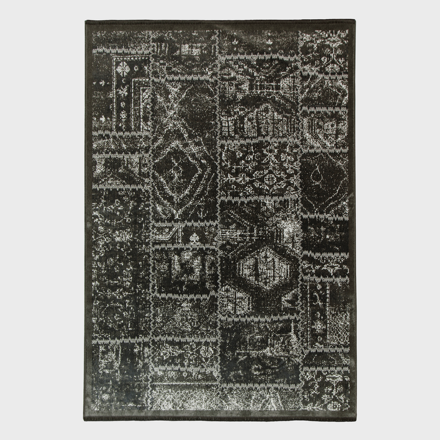 Black and white patterned rug with geometric designs