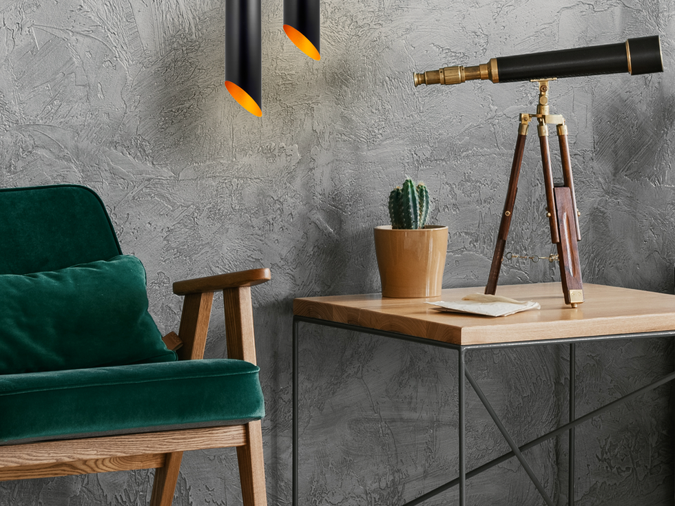 Black pendant lights illuminate living room